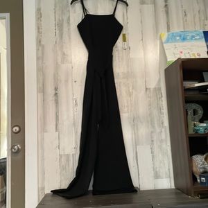 Full length black jumpsuit. Beautiful. Never worn.